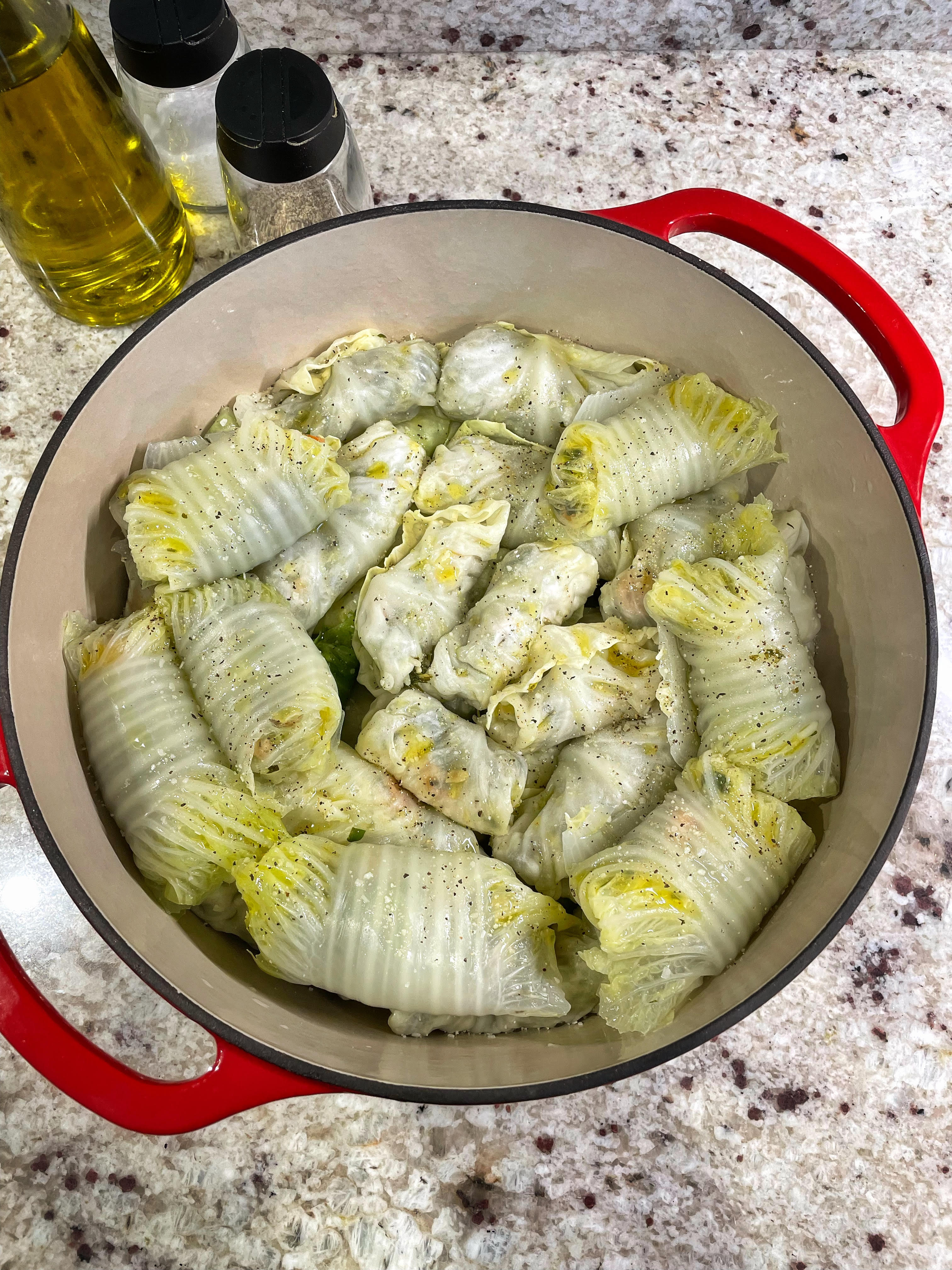 Chickpea and Rice Stuffed Cabbage Rolls lined in a pot, ready for cooking